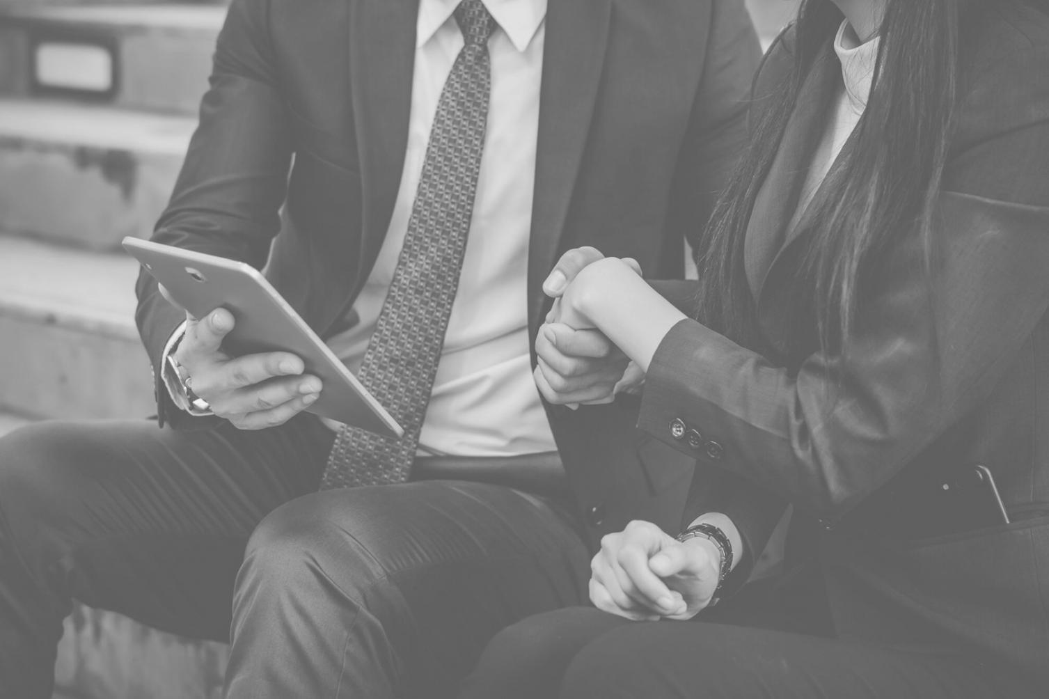 Students reviewing financial fundamentals workbook